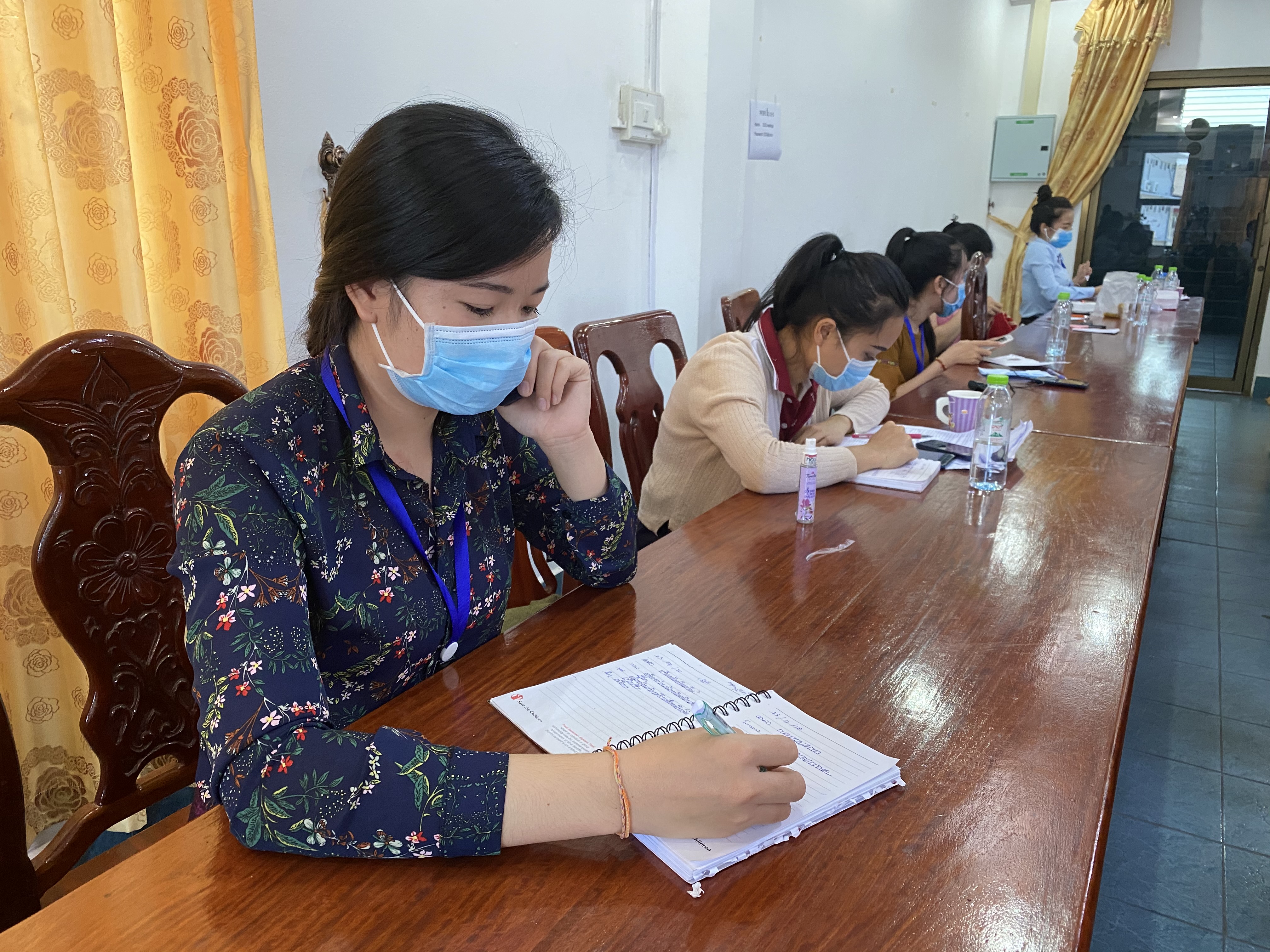 Answering the Call: Helping Field 5,000 COVID-19 Questions a Day in Laos