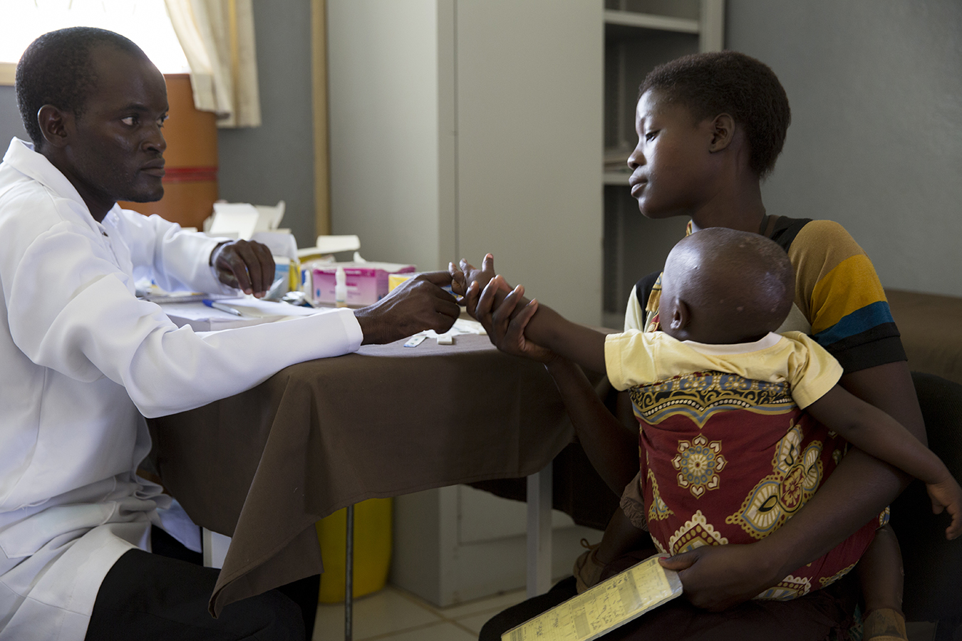 mozambique mother with doctor