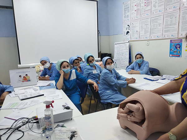 Tajikistan nurses receiving midwife training