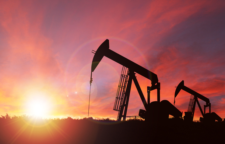 Sunset Over Pumpjack Silhouette