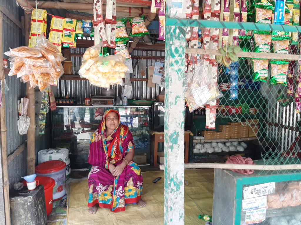 Feroza Begum is at her grocery shop. Image Credit:  USAID FTF BNA