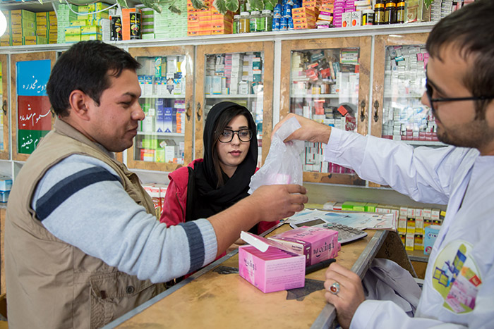 Afghanistan SHOPs PLUS asmo products being bought in drug store