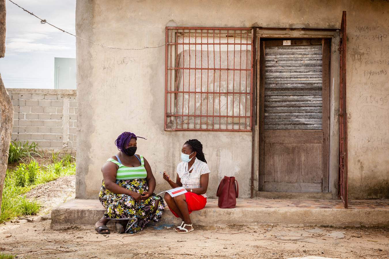 health worker visits patient at home