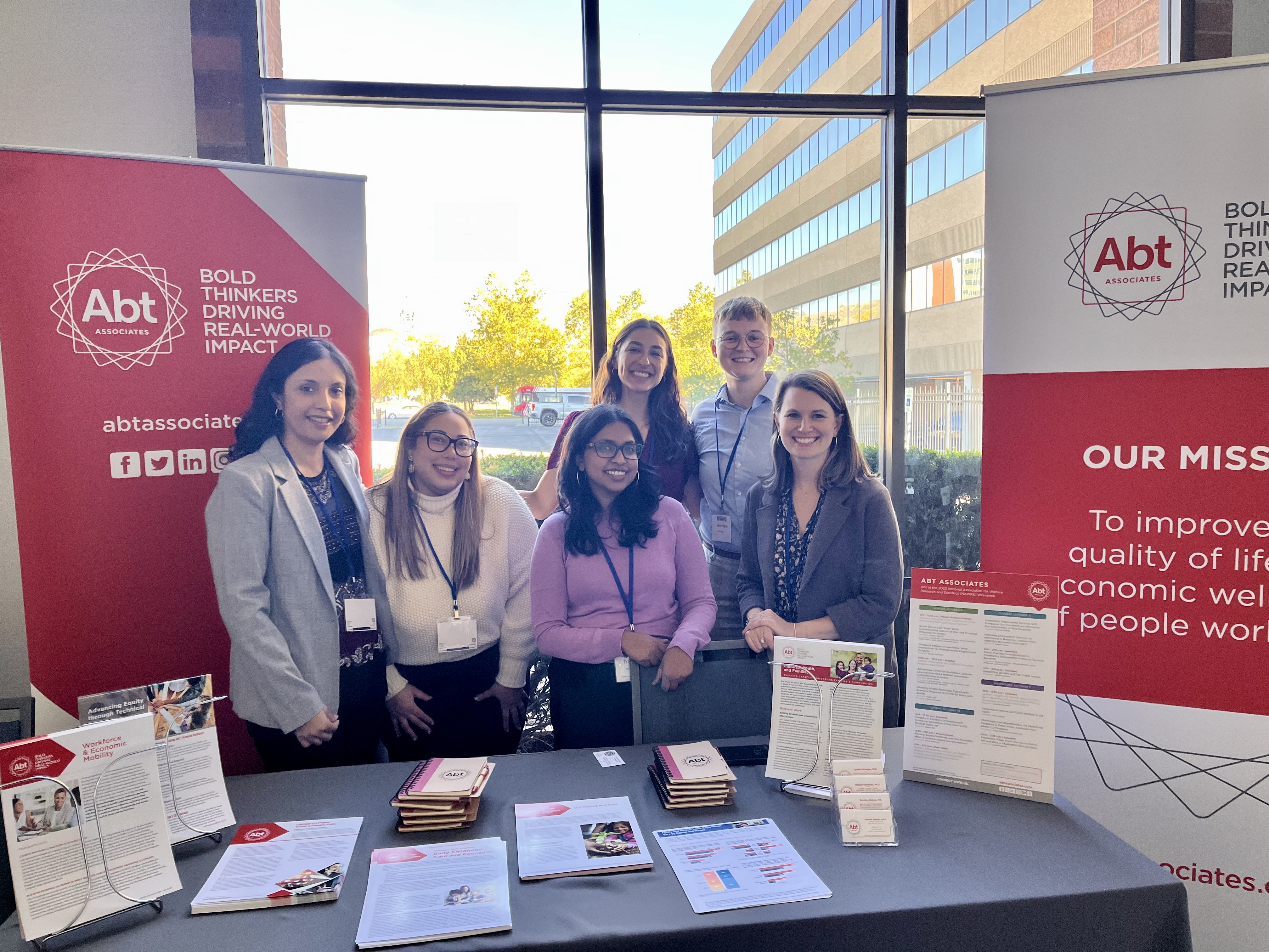 Experts Radha Roy, Brooke Abrams, Tresa Kappil, Marissa Cuellar, Holly Harris, and Hannah Engle at Abt’s booth at the 2023 NARWS Workshop.