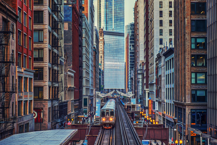 Thriving Communities: A Catalyst for Healthier Neighborhood. Description: Elevated trains of Chicago's Rail Transportation