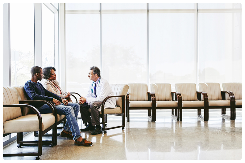 Medical professional consulting with a patient