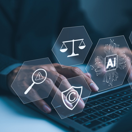 Hand typing on laptop with digital icons representing artificial intelligence, legal standard, ethics, and regulatory compliance, Technology law and policy