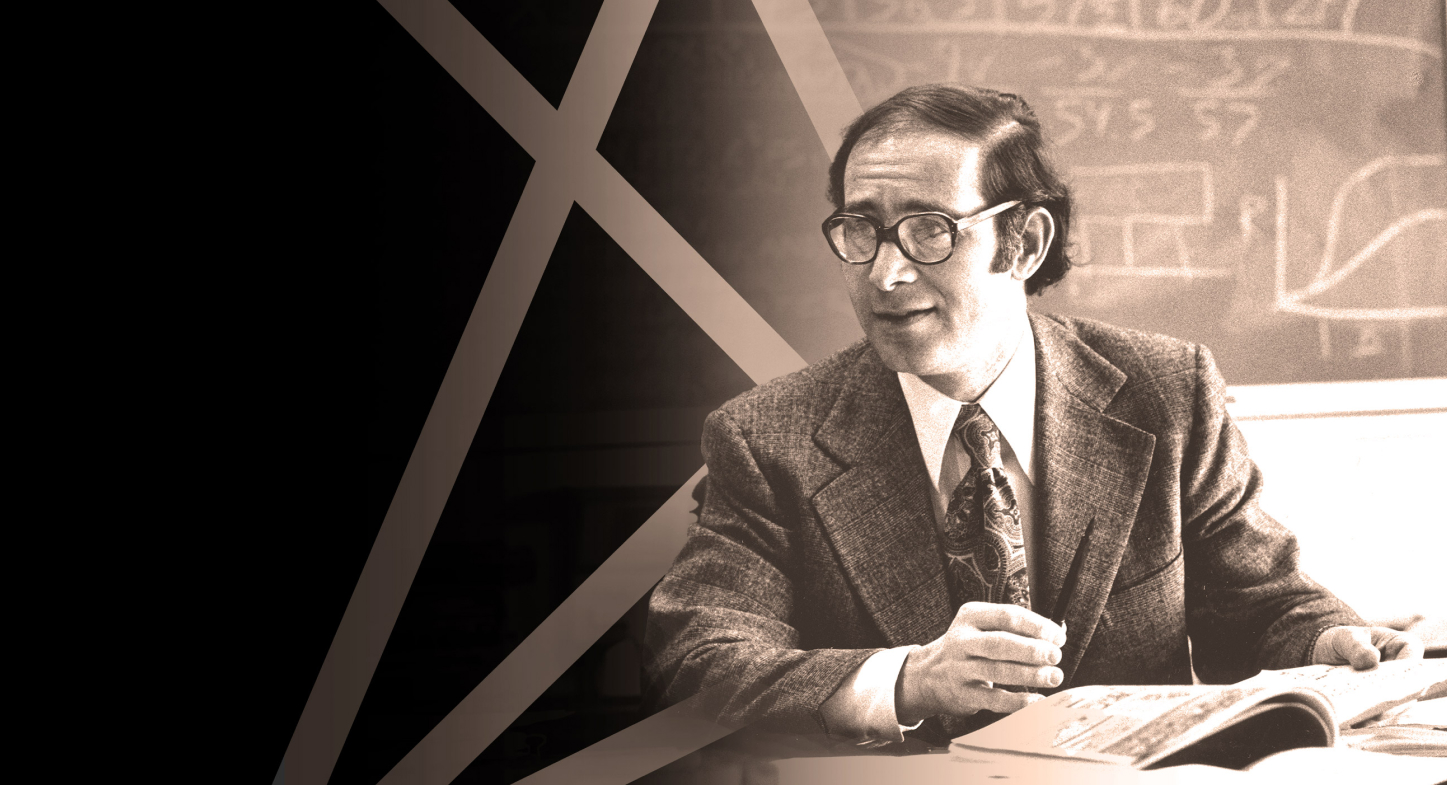 Clark Abt in the 1960s in front of a chalkboard