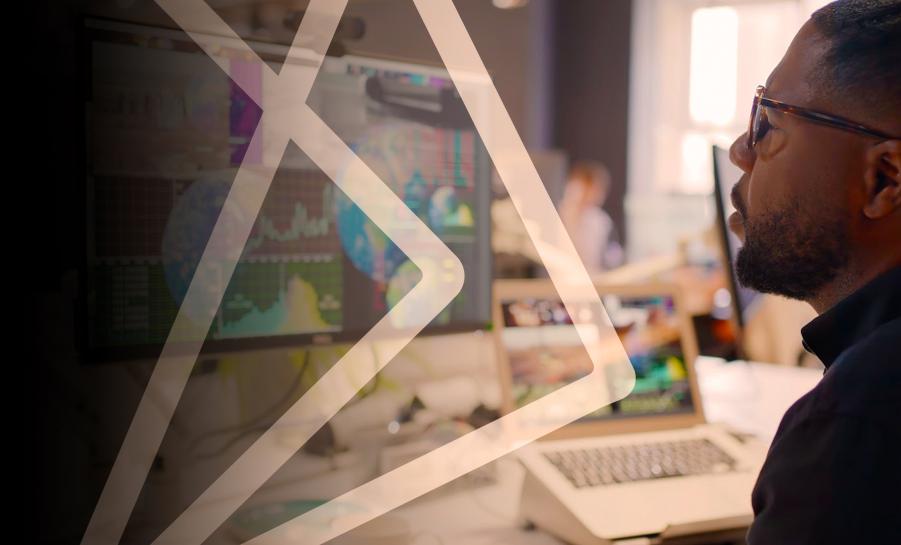 man sitting at computer