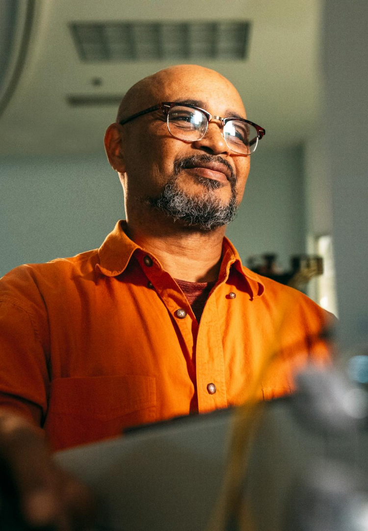 Man in glasses smiling