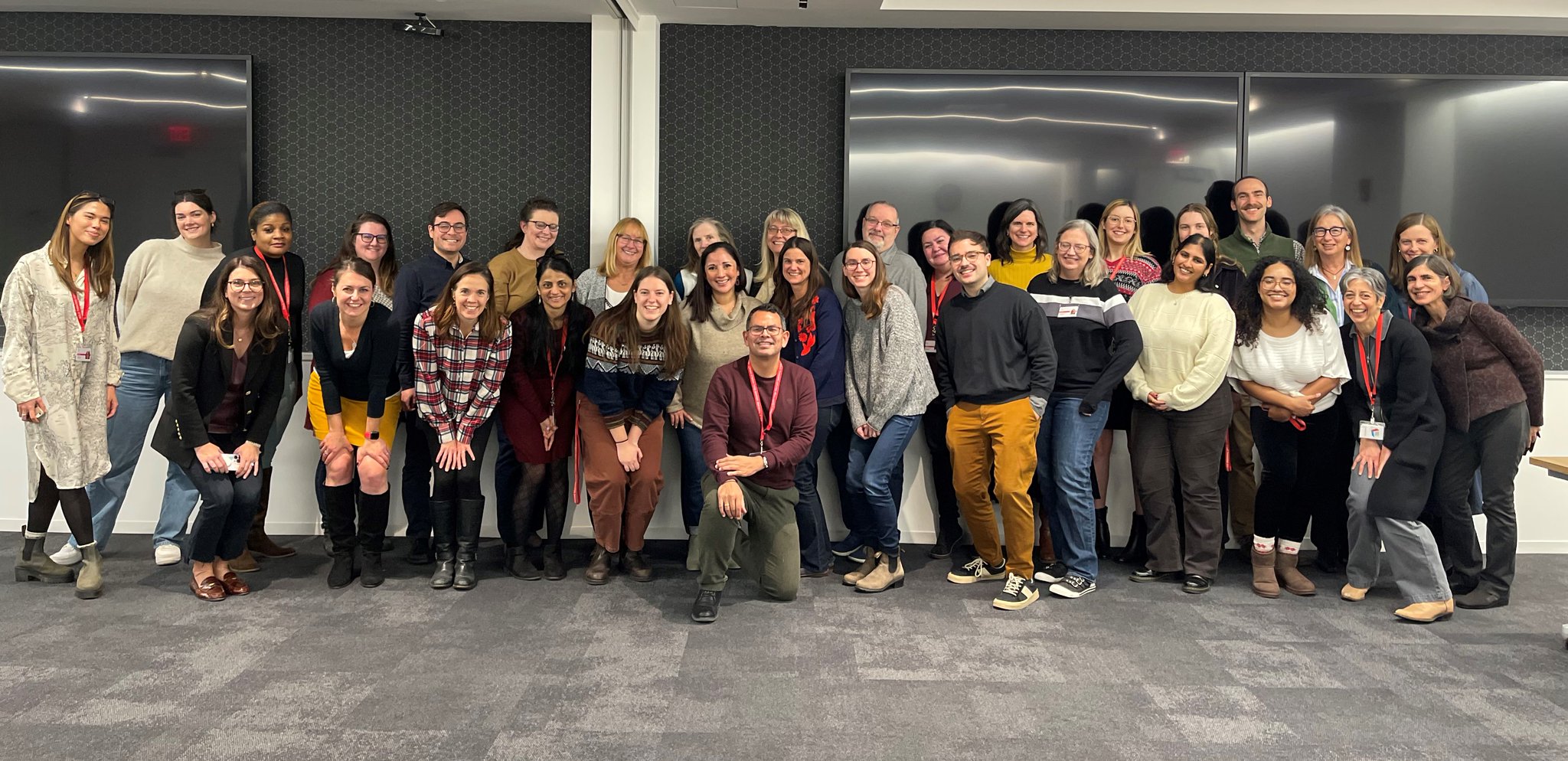 large group of abt staff smiling and posing