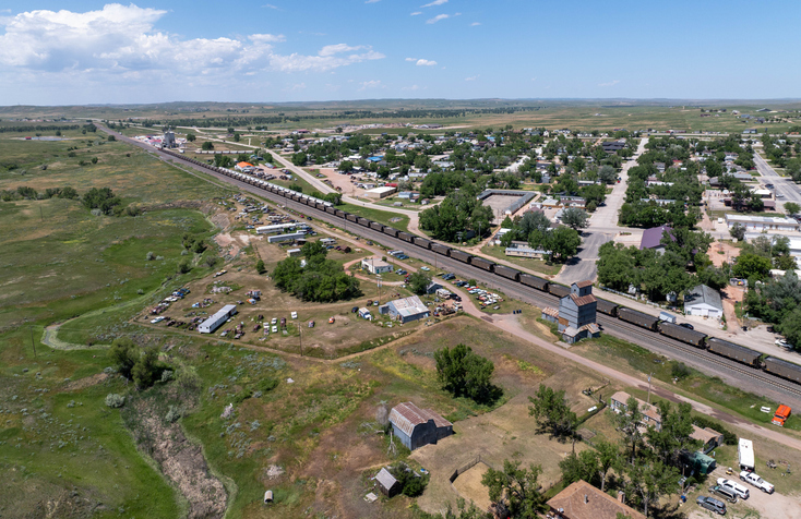 High Angle Aerial View of a Historic Grain Elevator and Railway in Moorcroft, Wyoming