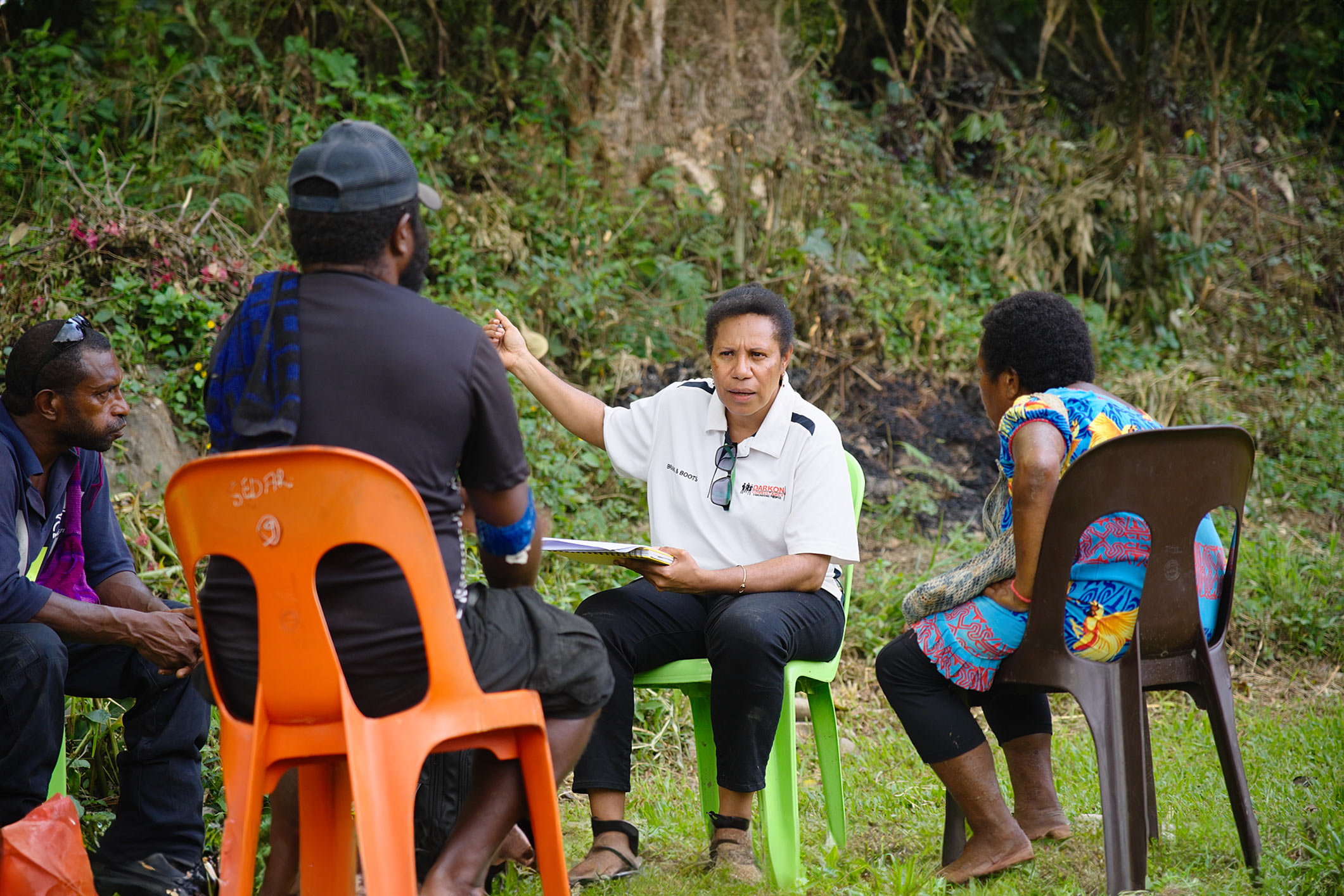 government representative talking with constituents outside