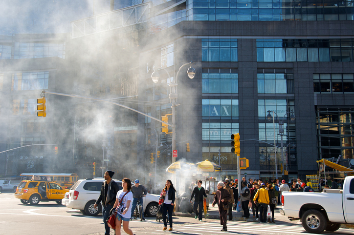  Food cart's smoke pollution as pedestrians cross, Columbus Circle NYC