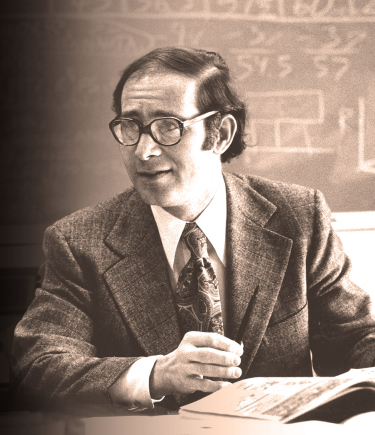Founder Clark Abt sitting at his desk in Abt’s Cambridge, Massachusetts office.