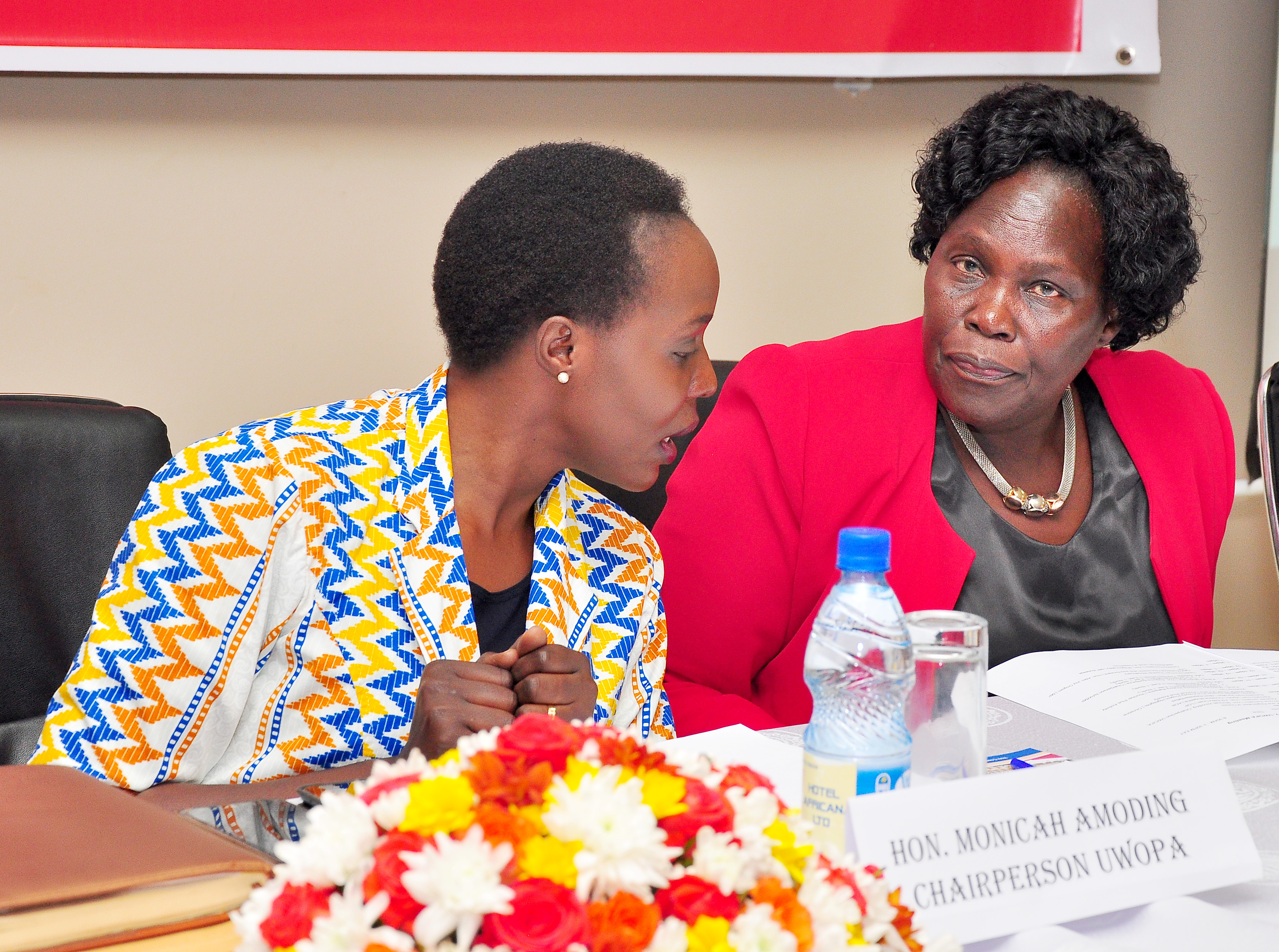 Uganda Women Parliamentary Association (UWOPA) Chairperson, Monicah Amoding speaks with the Leader of Opposition, Betty Aol Ochan