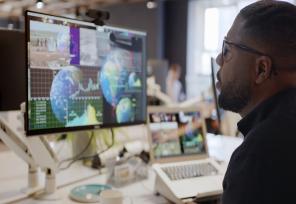 man sitting at a computer