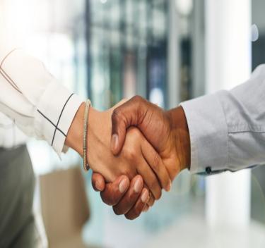 Two people shaking hands