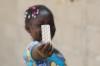 african girl with pill packet