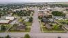 Main street stretching along rural residential neighborhood of Garden City, Kansas