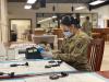 soldier in a lab conducting medical research