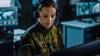 Military Surveillance Officer in Headset Working in Central Office Hub for Cyber Operations